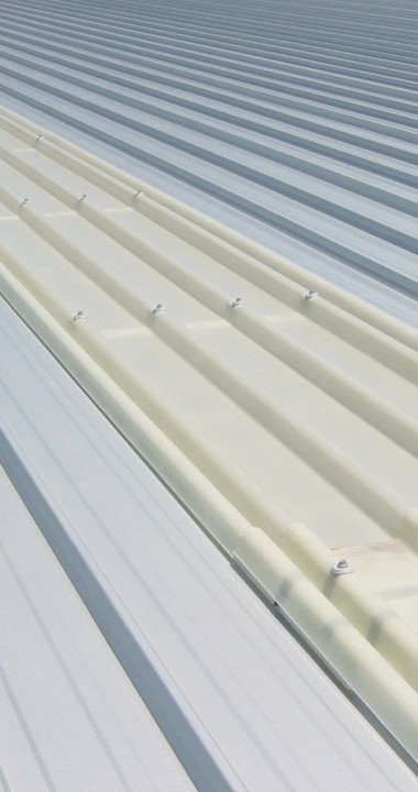 Clearslide GC clip system for long-run metal roofing